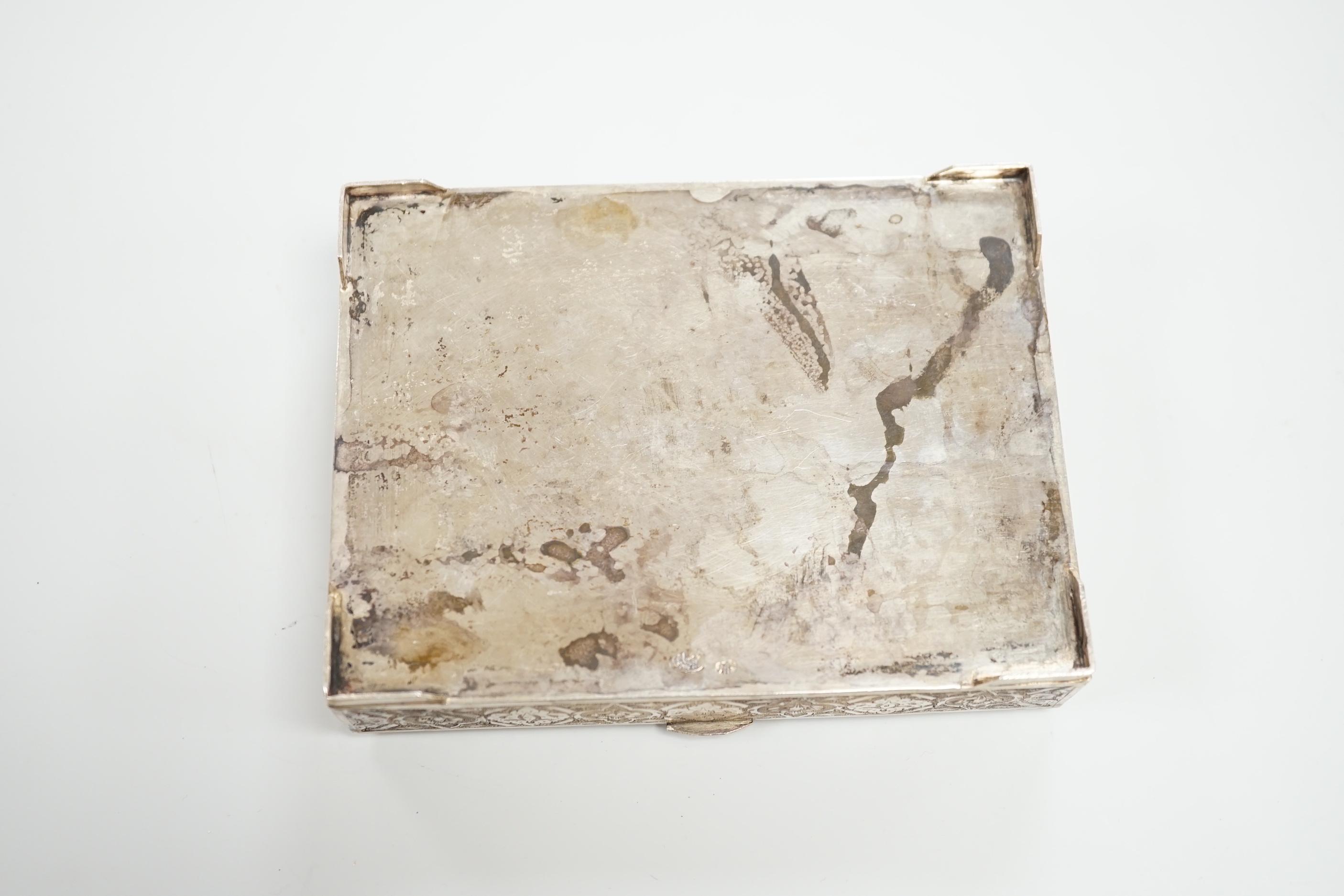 A Persian white metal rectangular box with hinged cover, 12cm, 260 grams.